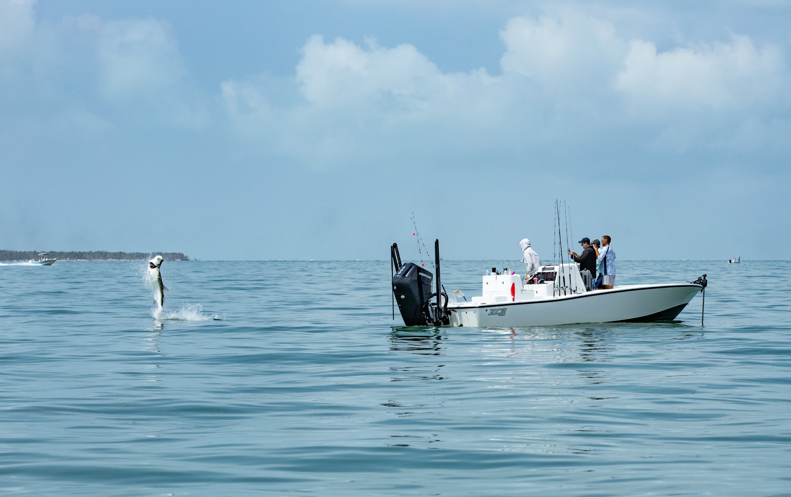 Tarpon Tournament fish jump at South Seas