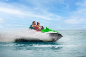 Family enjoying a jet ski ride at South Seas
