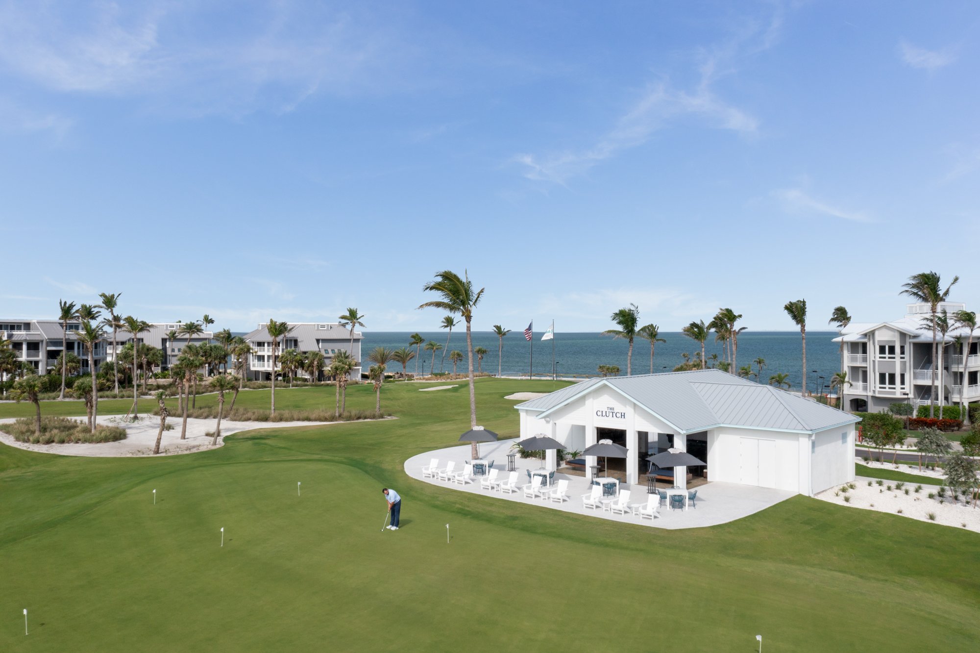 Golf clubhouse and putting green overlooking the ocean