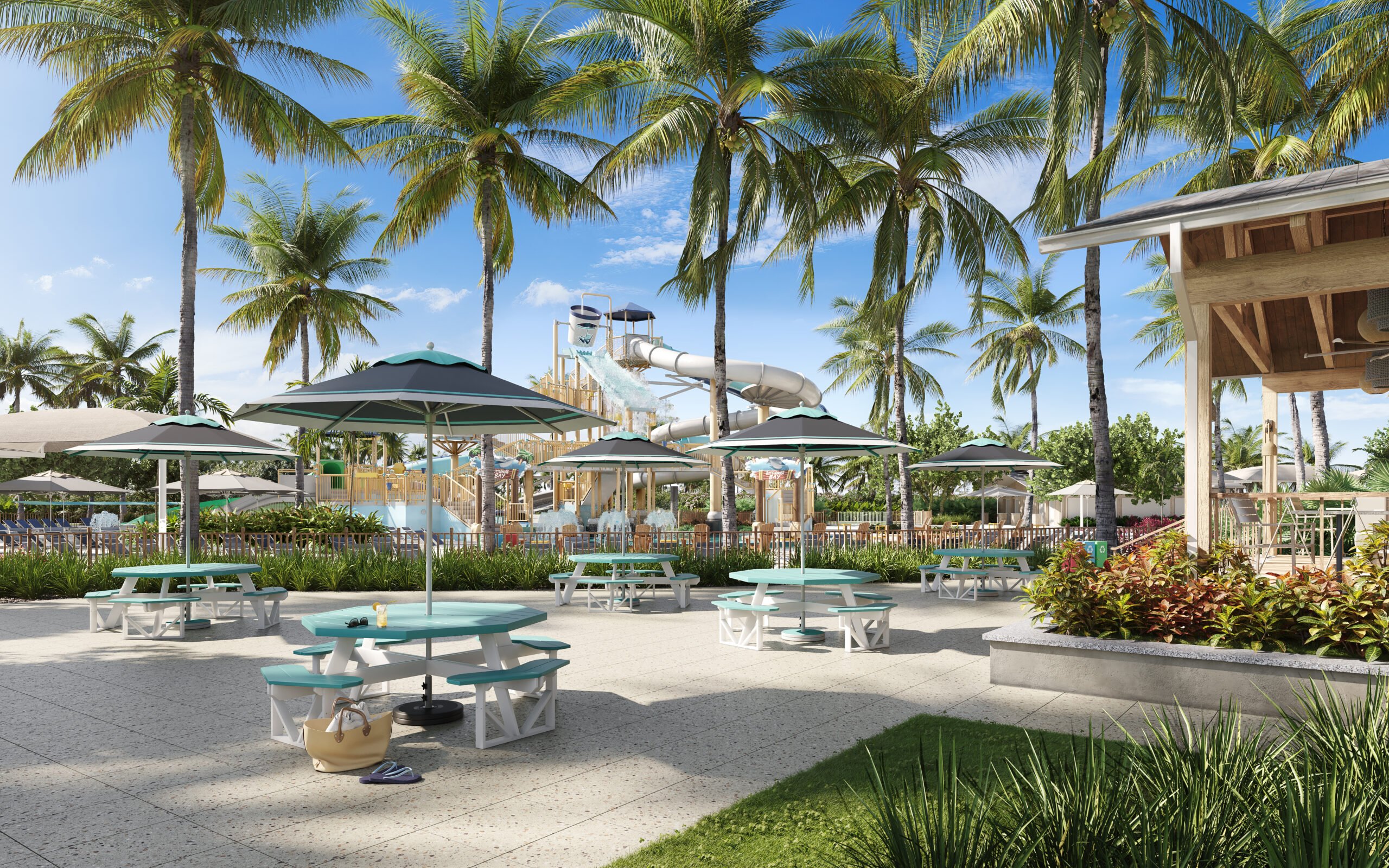 Shaded picnic area near the Captiva Landing water park play area, surrounded by palm trees